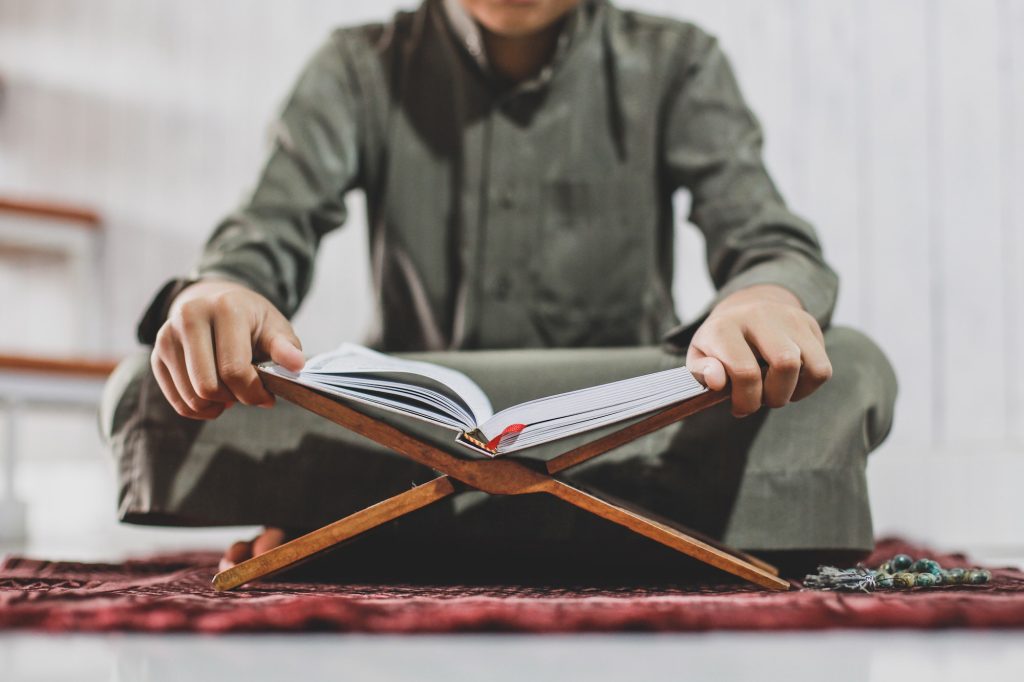 Muslim Man Reading Holy Quran